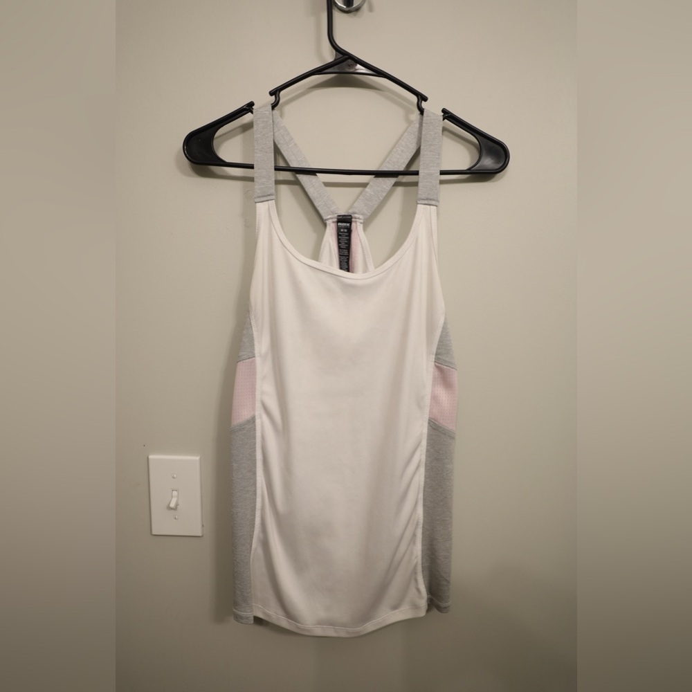 White, pink, and grey work out tank in medium